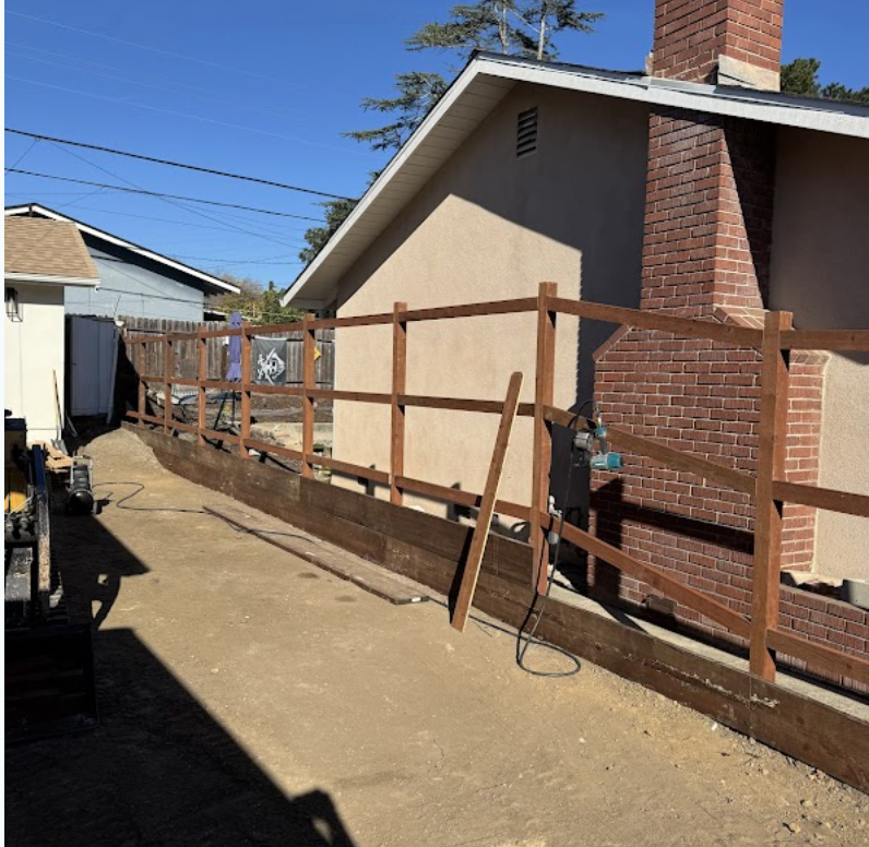 Exterior fence framing in progress on Central Coast California residential project