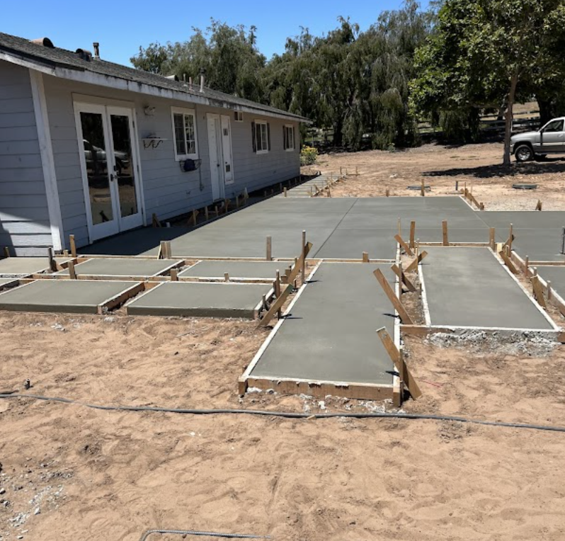 Concrete foundation footing and slab formwork in progress San Luis Obispo California